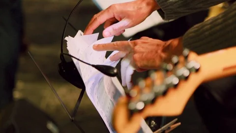Music notes. Guitar. Synthesizer Stock Footage 128918655