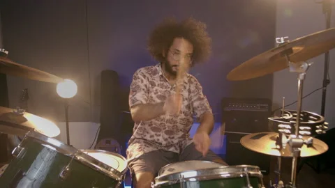 Music Production Studio. Creative world. Hispanic man playing drums in the Stock Footage 138654701