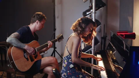 Music recording studio. Creative process. Caucasian man and hispanic woman Stock Footage 139895448