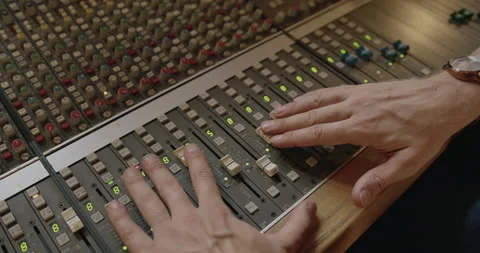 Music Recording Studio Mixing Panel with Hand on Fader Stock Footage 204736443
