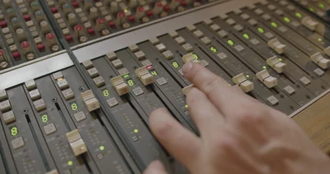 Music Recording Studio Mixing Panel with Hand on Fader Stock Footage 204736454