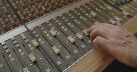 Music Recording Studio Mixing Panel with Hand on Fader Stock Footage 204736458