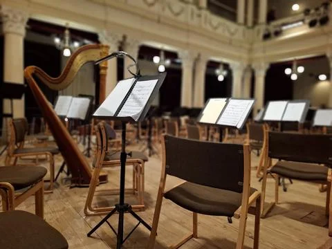 Music score with notes in hall of the conservatory at classical music concert Foto stock