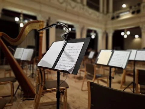 Music score with notes in hall of the conservatory at classical music concert Foto stock