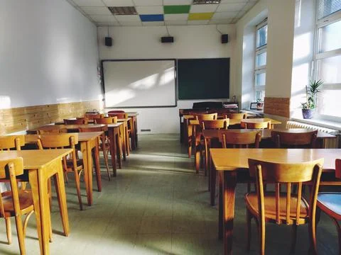 Music solfeggio empty class at school. The sun's rays fall on the floor through Stock Photos
