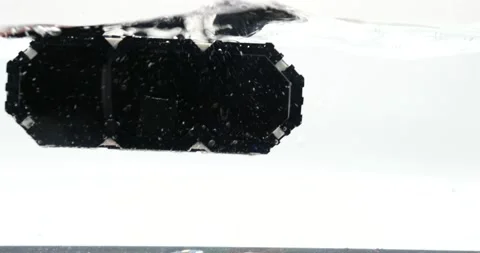 Music speaker falling into the water isolated on white splashing Stock Footage 219520867