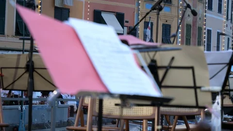 Music stand in a town square  Stock Footage 95779643