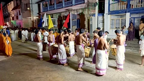 Musical artists playing drum instruments as a part of Mahavir jayanti. Stock Footage 314241279