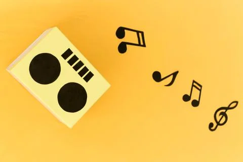 Musical background. notes on a yellow background Stock Photos
