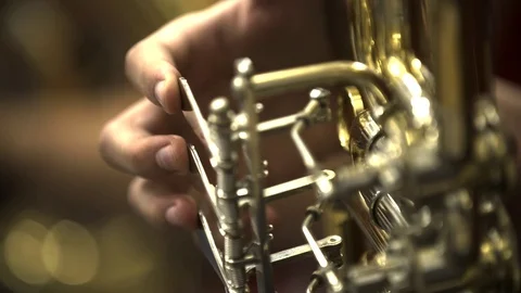 Musical brass instrument,
being played by a musician at a orchestra Stock Footage