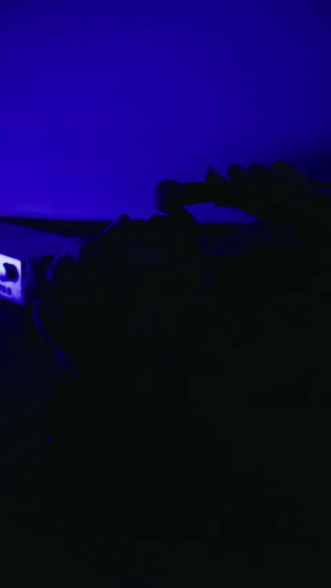 Musical expression: Rapper or singer male reclines, immersed in vocal Stock Footage 270927425