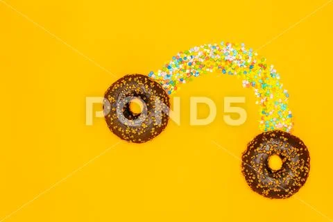 Musical food concept. Donuts and confectionery dressing in the form of Stock Photos