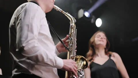 Musical group band dancing, singing performing on concert musician stage with Stock Footage 194762476