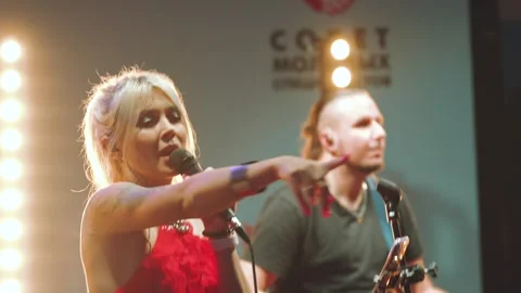 A musical group performs on stage Stock Footage 245837700