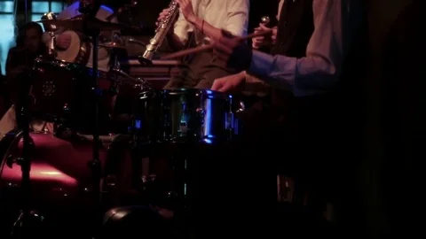 Musical group playing jazz in the evening at a cafe. slow motion, 1920x1080 Stock Footage 78973387