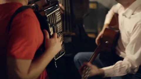 The musical group plays Stock Footage 69867589