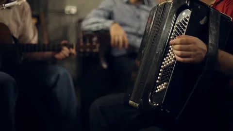 The musical group plays Stock Footage 69869977