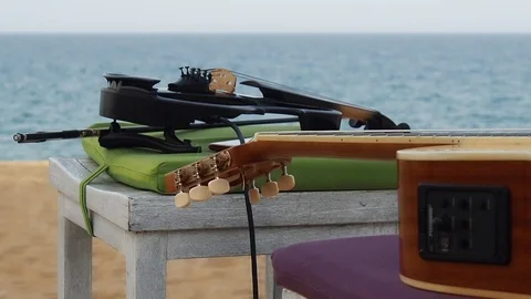 Musical instruments on the background of the sea Video stock 91144159