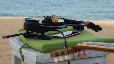 Musical instruments on the background of the sea Stock Footage 91144248