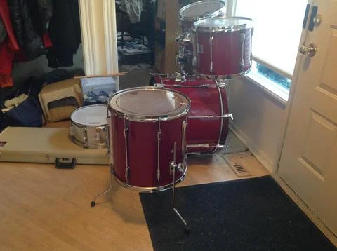 Musical Instruments at the door - Drumkit Stock-Fotos
