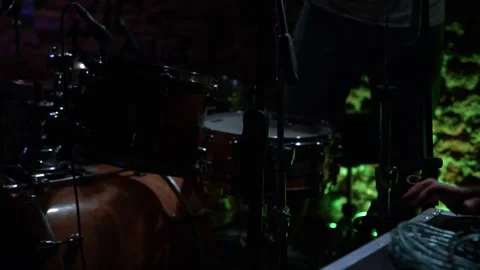 Musical instruments, drums, a drummer preparing for a performance Stock Footage 252490510