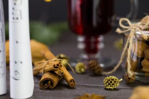 Musical notes against the background of a burning christmas drink Stock Photos