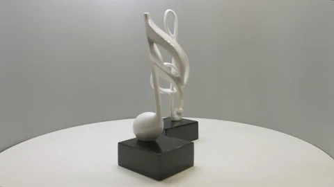 Musical notes are spinning, bathed in white light. Stock Footage 155080053