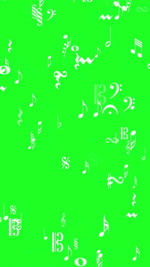 Musical notes falling dynamically on a bright green background vertical video Stock Footage 311409218