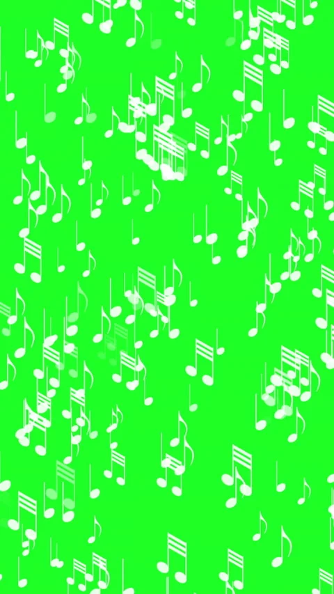 Musical notes falling dynamically on a bright green background vertical video Stock Footage 311409325