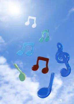 Musical notes floating in blue sky 库存照片