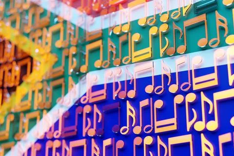 Musical notes lined up in even rows against the backdrop of the National Flag 스톡 일러스트
