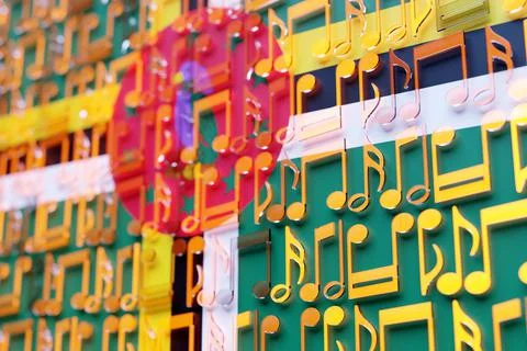 Musical notes lined up in even rows against the backdrop of the National Flag Stock Illustration