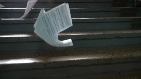 Musical notes. Paper falls to the floor | Stock Video | Pond5