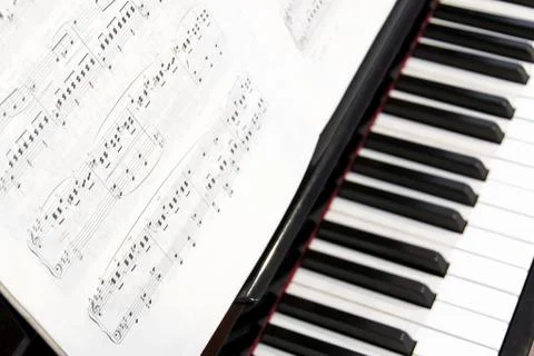 Musical notes on piano Stock Photos