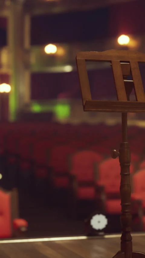 Musical performance setup in theater with empty seats at night Stock Footage 339508890