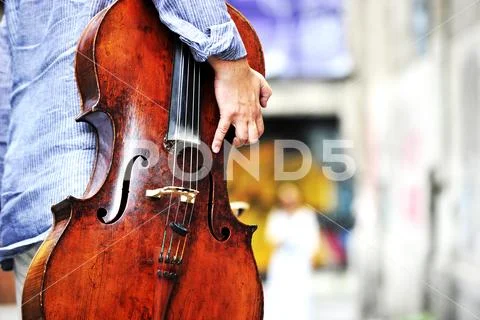 Musician with cello instrument Stock Photos