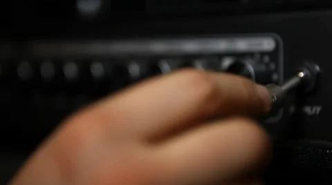 Musician configures remote Vídeo Stock 47792861