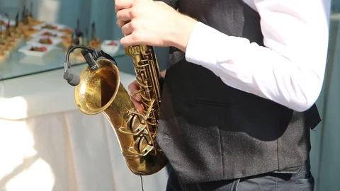 The musician performs the work on the saxophone. Stock Footage 101705077