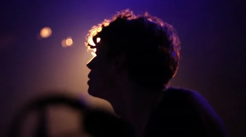 Musician playing and dancing in the backlight Video stock 55876631