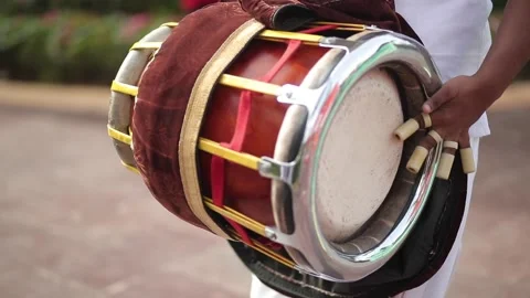 A musician playing the dholak instrument at a function in New Delhi, India Stock Footage 203149982