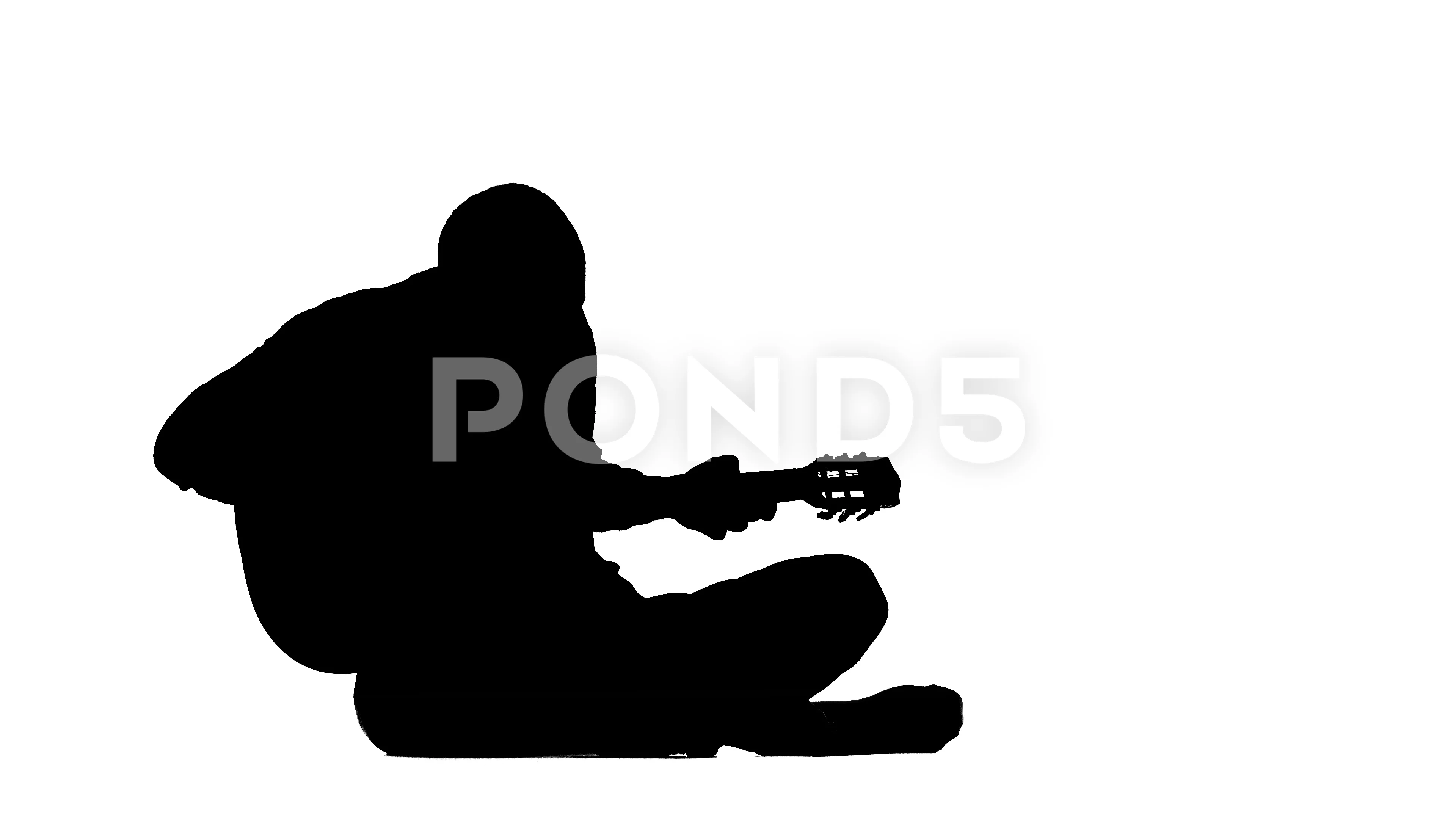 man sitting on ground silhouette