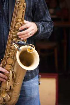 Musician playing instruments Stock Photos