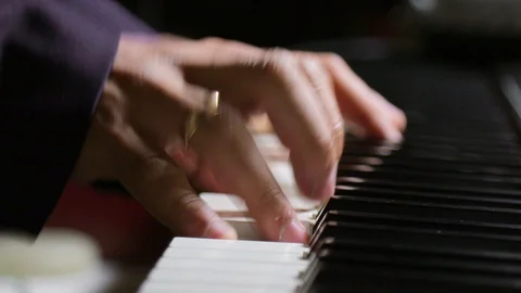 Musician playing on the keyboard synthesizer piano keys. Musician plays a mus Stock Footage