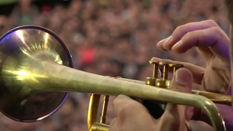 A musician playing on a pipe in front of thousands of people Stock Footage 91550155
