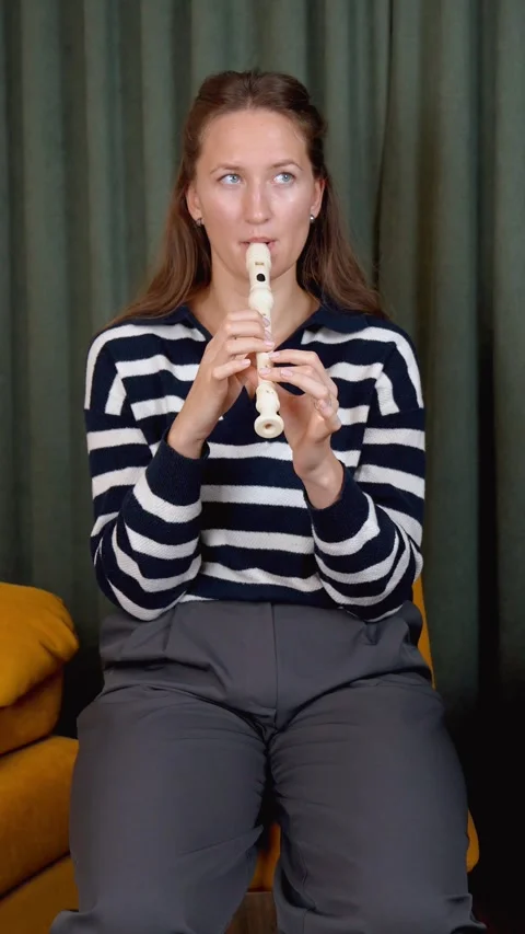 Musician playing recorder flute in split screen montage Stock Footage 299751843