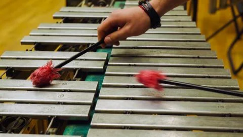 Musician playing vibraphone with mallets in motion blur Stock Photos