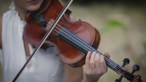 Musician playing violin. Close up Stock Footage