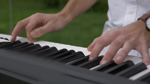 The musician plays on keyboard Video stock 106945492