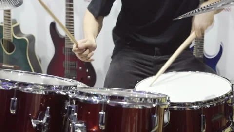 The musician plays percussion instruments. Video stock 255896291