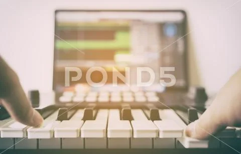 Musician is recording Electronic music on computer Stock Photos